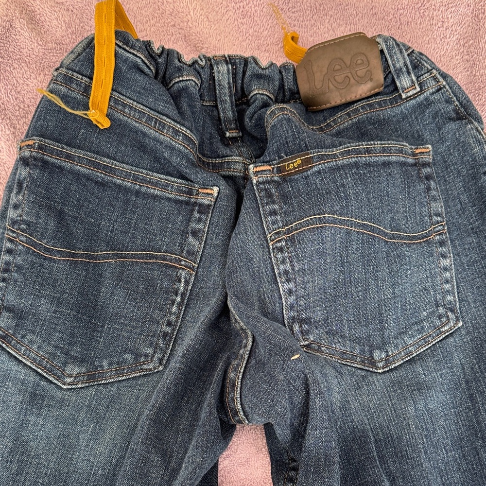 Lee Dark Blue Jeans with Adjustable Straps for a young teen boy.